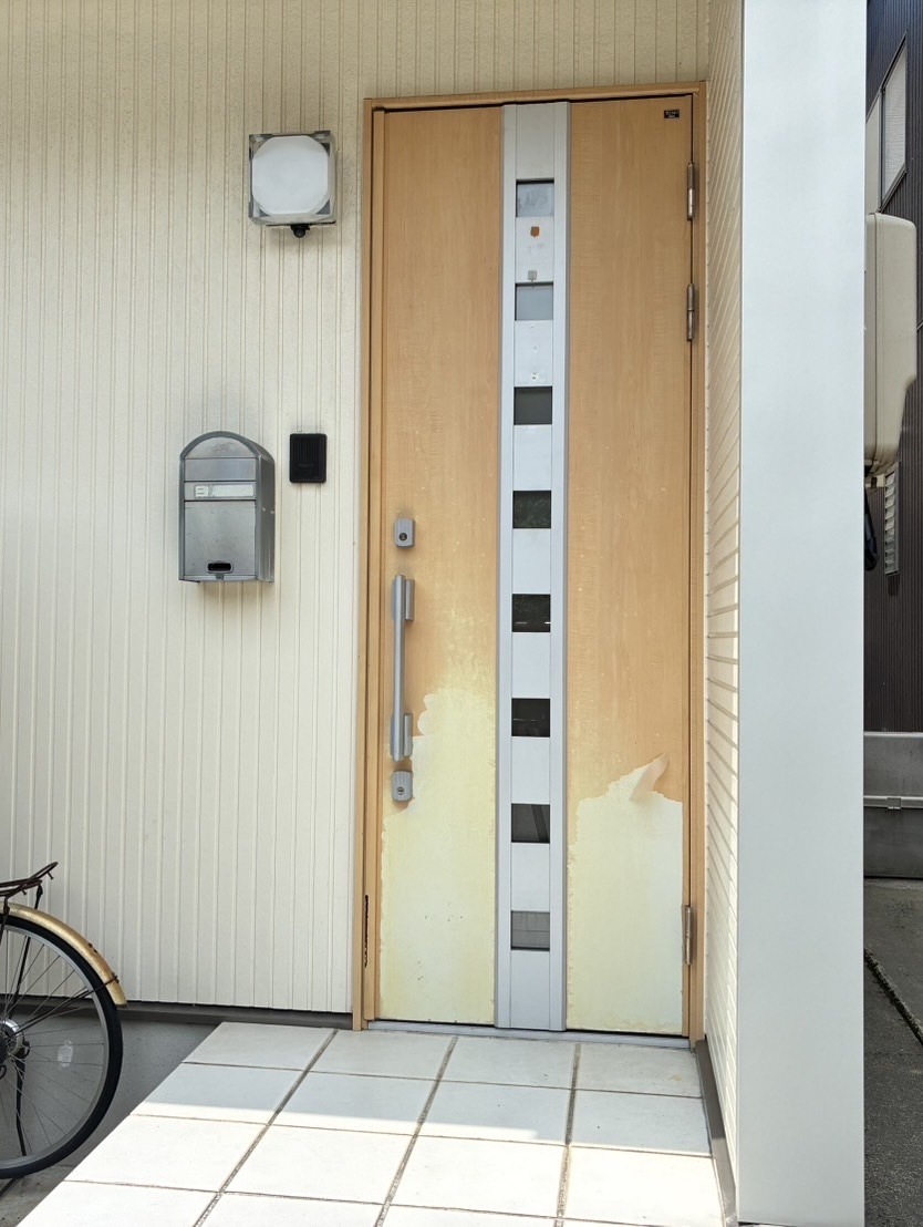 玄関ドアシート貼り